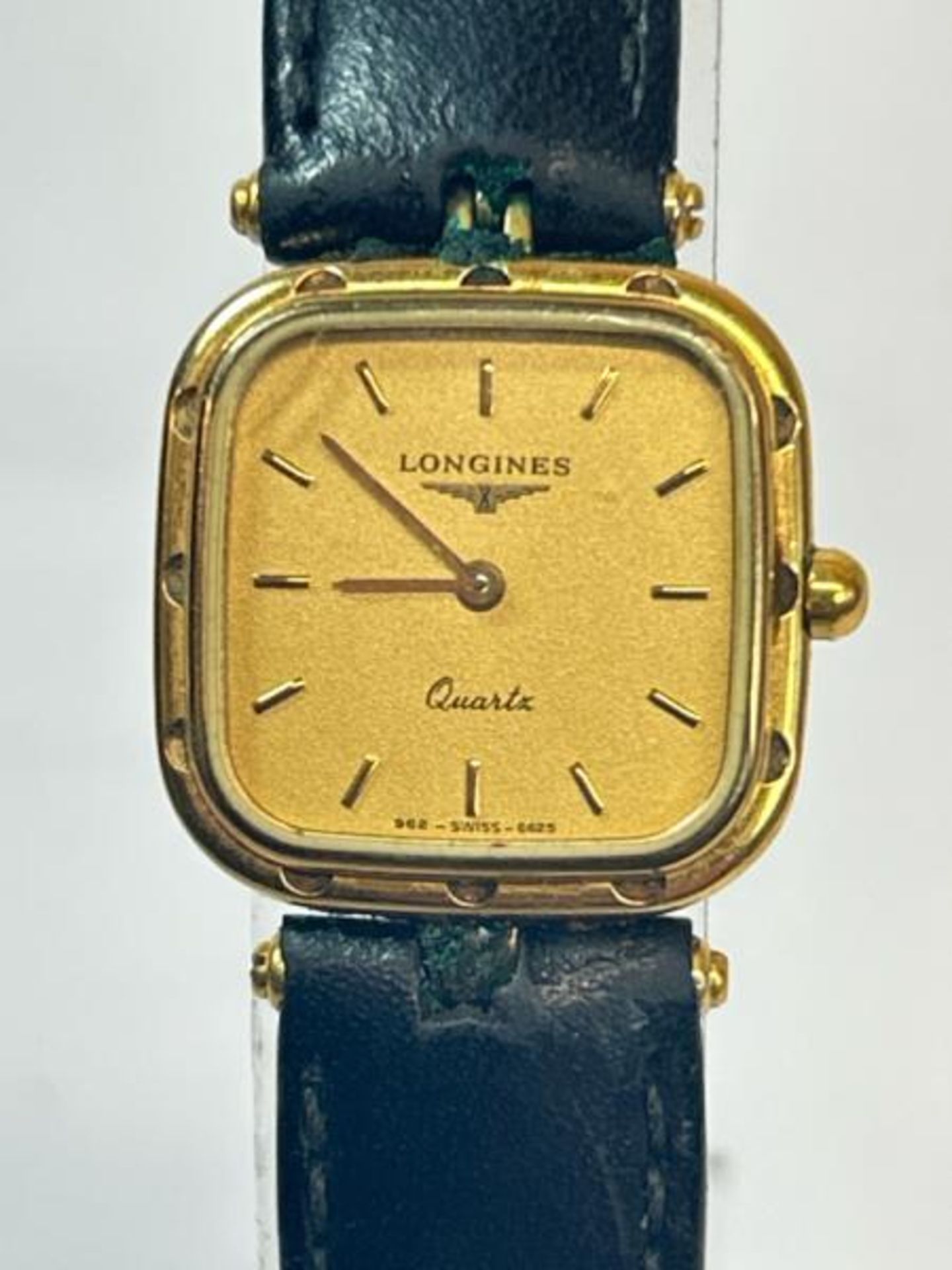 Vintage Longines gold plated wristwatch no.21712443 with quartz movement on black leather strap / SF