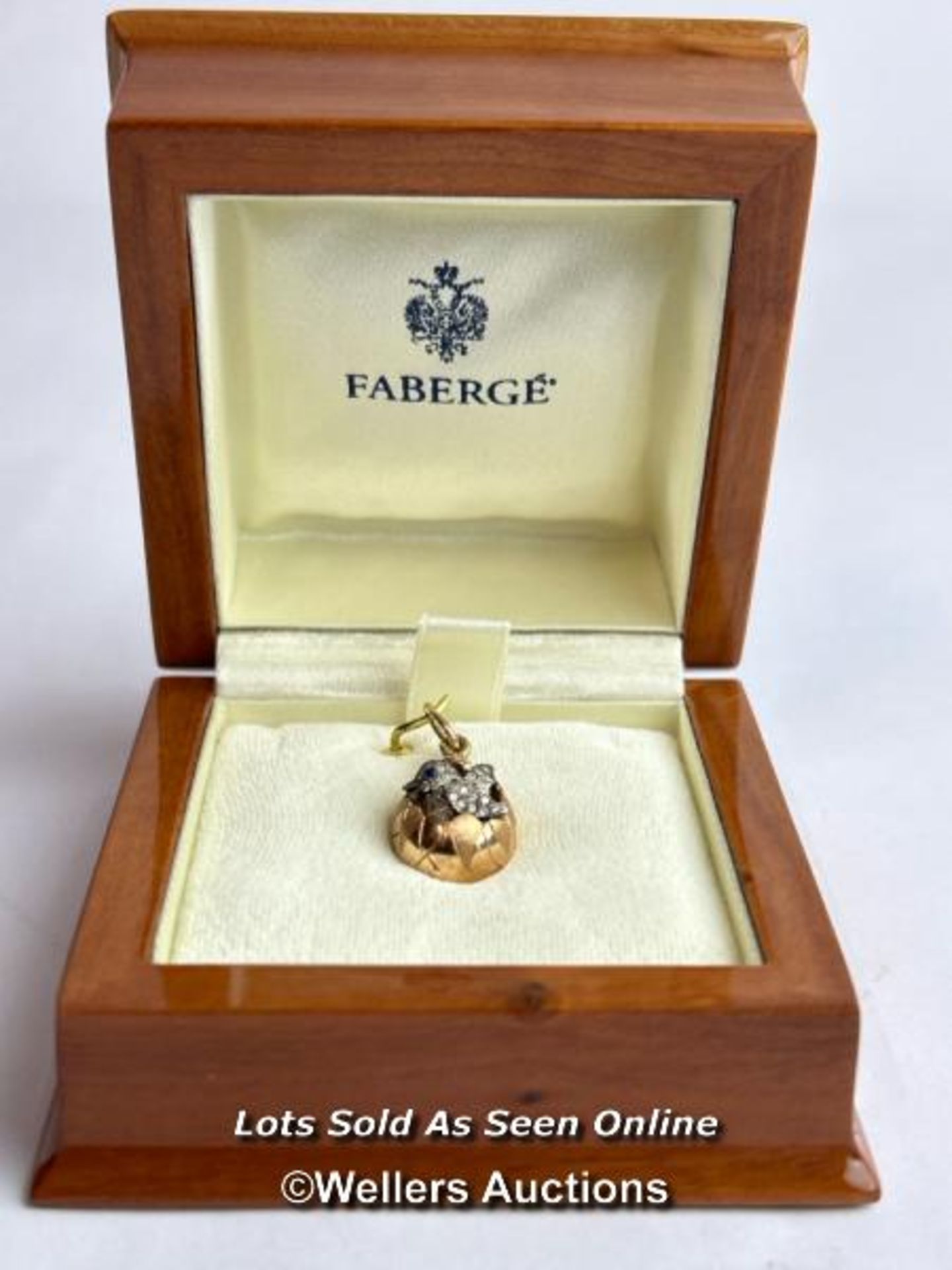 A Faberge style egg pendant with hatching diamond encrusted chick, measuring 20mm x 12mm, the loop - Image 5 of 6