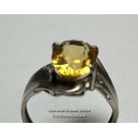 Hallmarked silver ring set with an ovel citrine and cubic zirconia detail on shoulders. Ring size, O