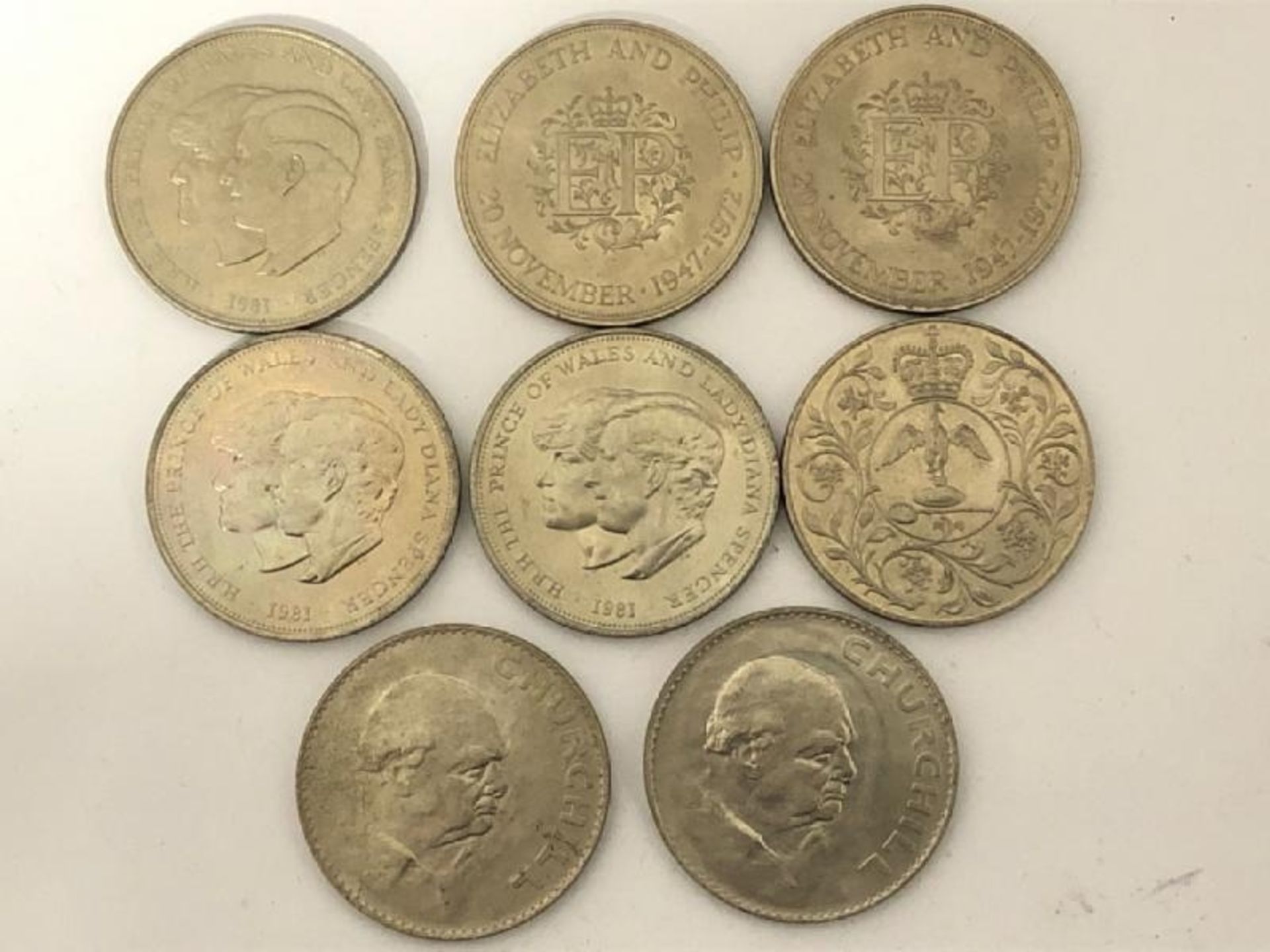 Eight commemorative coins including 1965 Churchill, 1977 Silver Jubilee,Charles & Diana and