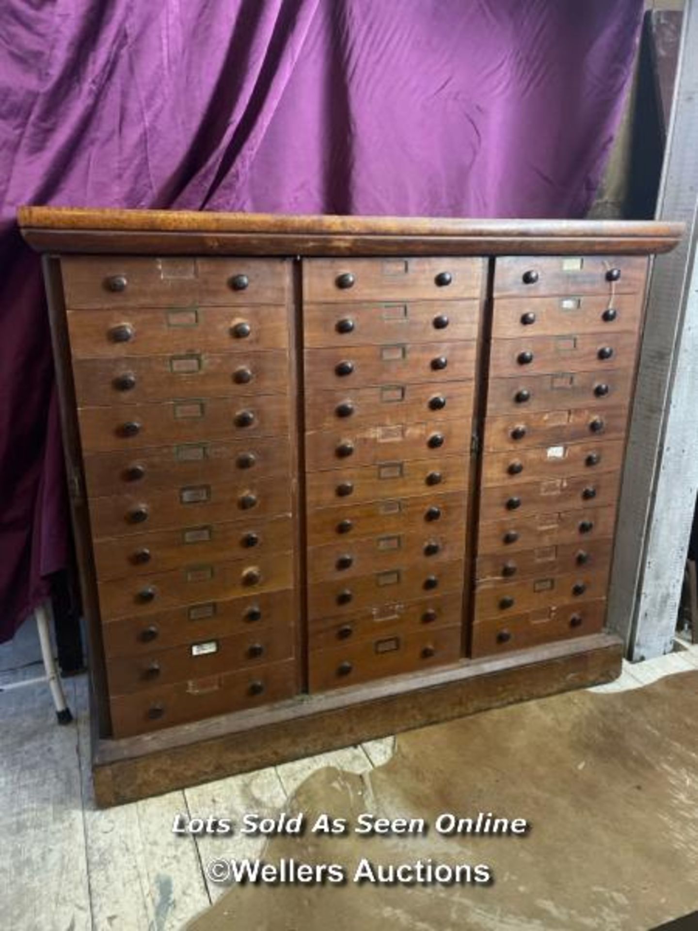 19TH CENTURY FLIGHT OF 33 DRAWERS, WALNUT VENEERS AND MAHOGANY LINED, 149 X 57 X 130CM