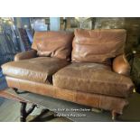 MODERN SOFA IN LEATHER HIDE, IN THE HOWARD DESIGN, NICELY LIVED IN WITH GENERAL WEAR AND TEAR