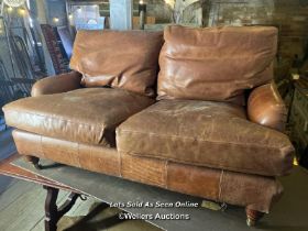 MODERN SOFA IN LEATHER HIDE, IN THE HOWARD DESIGN, NICELY LIVED IN WITH GENERAL WEAR AND TEAR