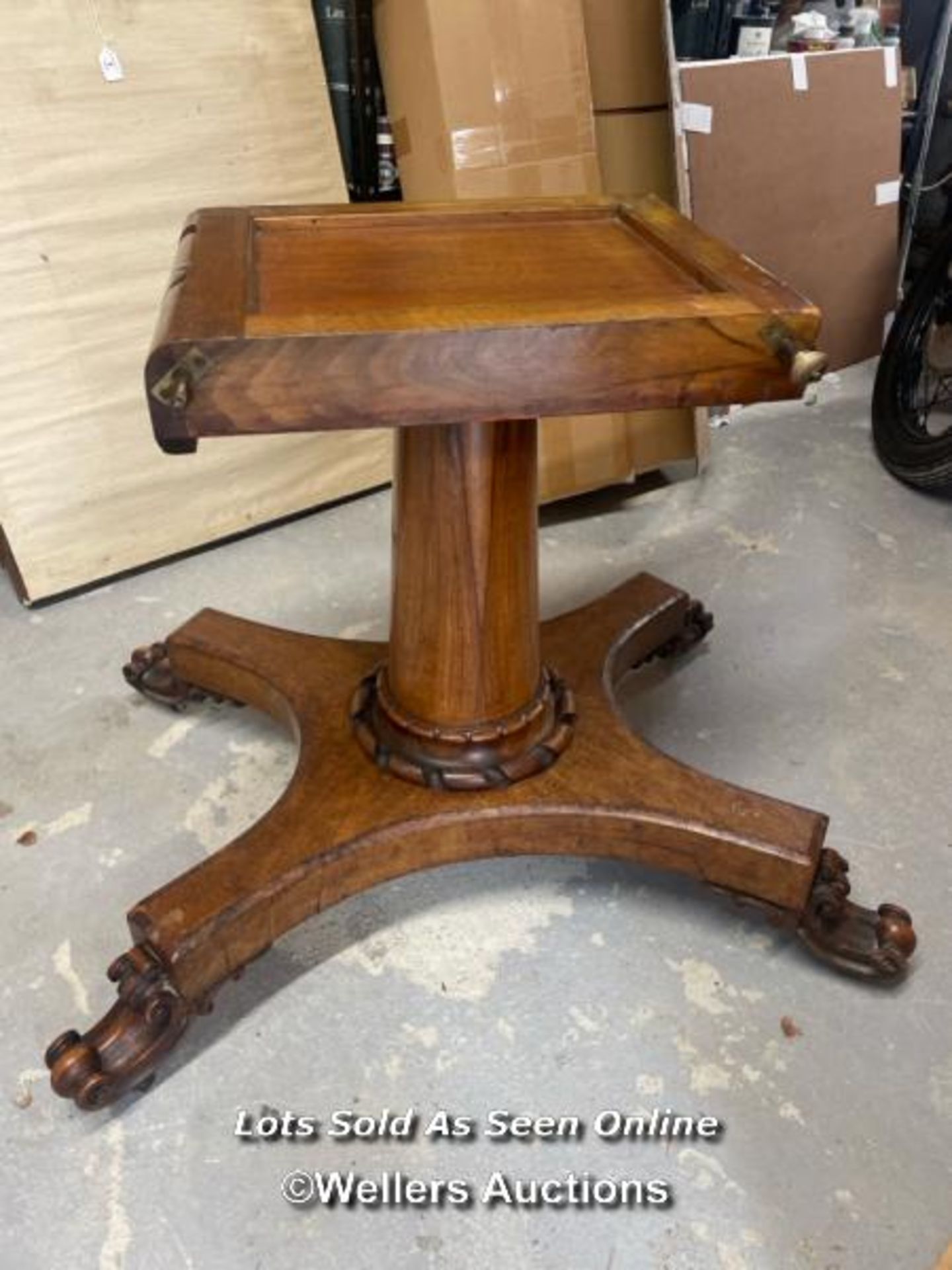 OVAL WALNUT CENTRE TABLE ON SOLID COLUMN BASE WITH FOUR DECORATIVE LEGS AND CASTORED FEET (IN NEED - Image 9 of 10