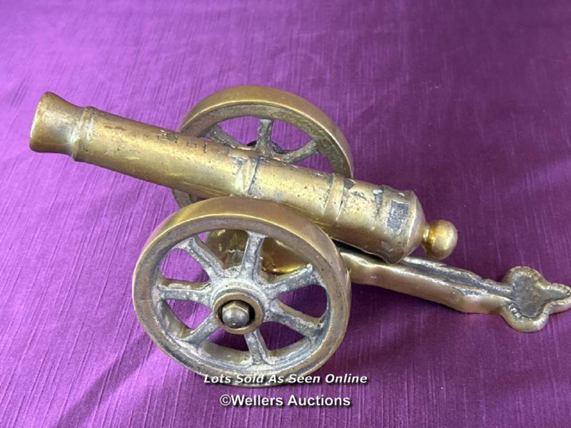 ORNAMENTAL BRASS CANNON DATED 1912