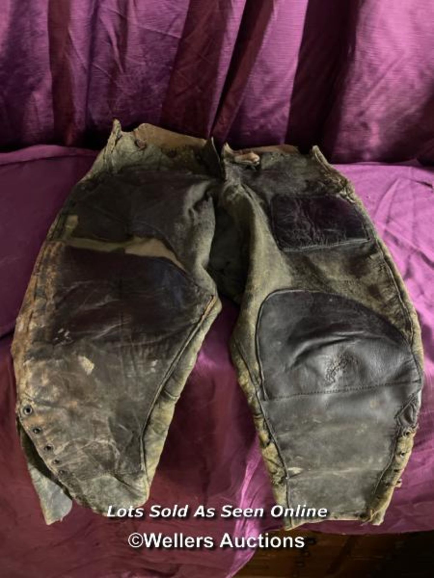 EARLY PILOTS OR MOTORCYCLE TROUSERS IN RELIC CONDITION, EXTREMELY WELL WORN, DISPLAY ONLY