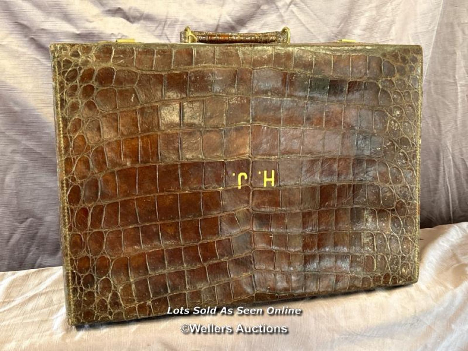 MAPPIN AND WEBB CROCODILE SKIN SUITCASE, CIRCA 1900, WITH INITIALS H.J. 53 X 19 X 37CM
