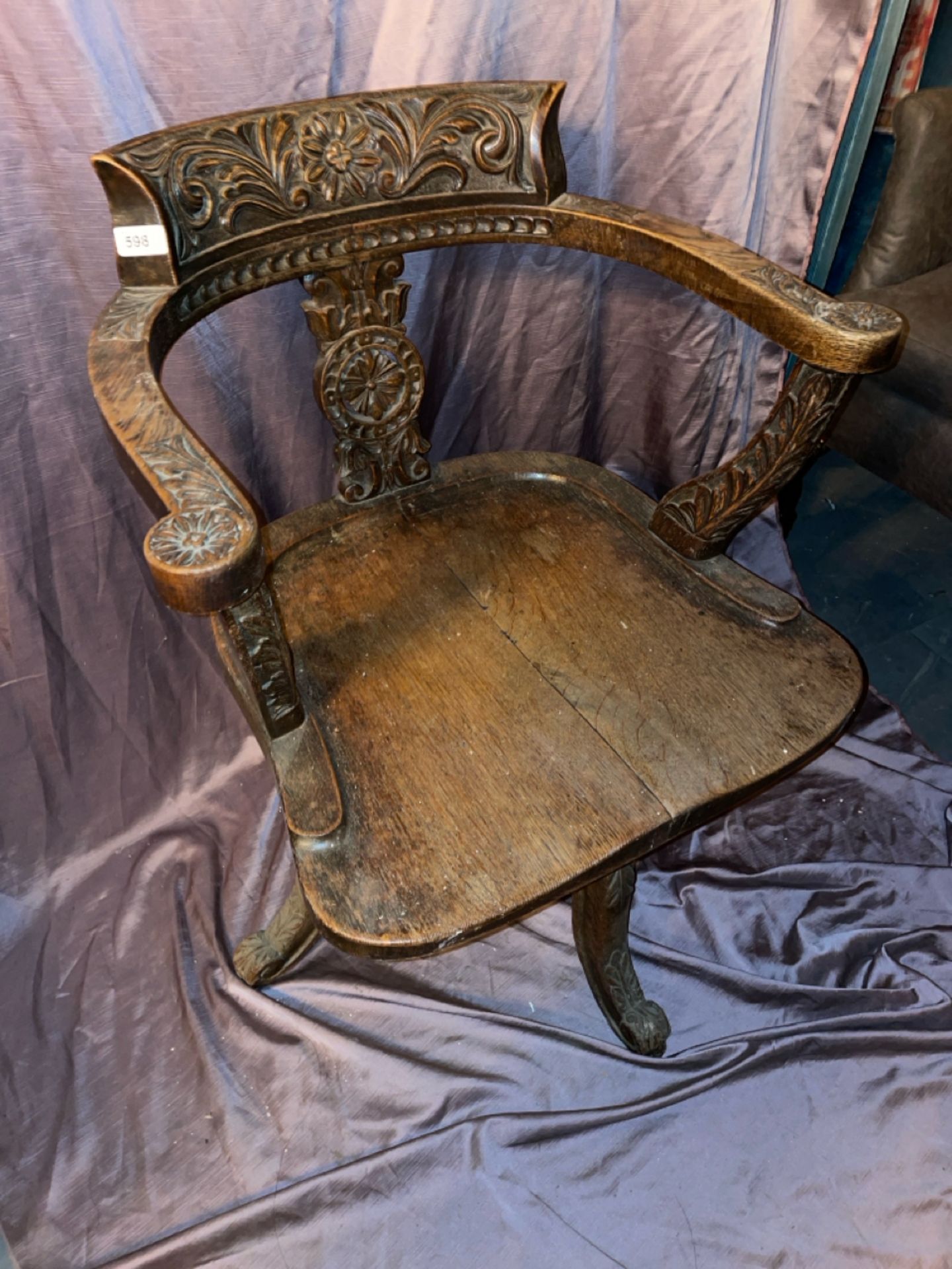 OAK CAPTAINS CHAIR WITH FOLIATE CARVING, 56 X 52 X 81CM