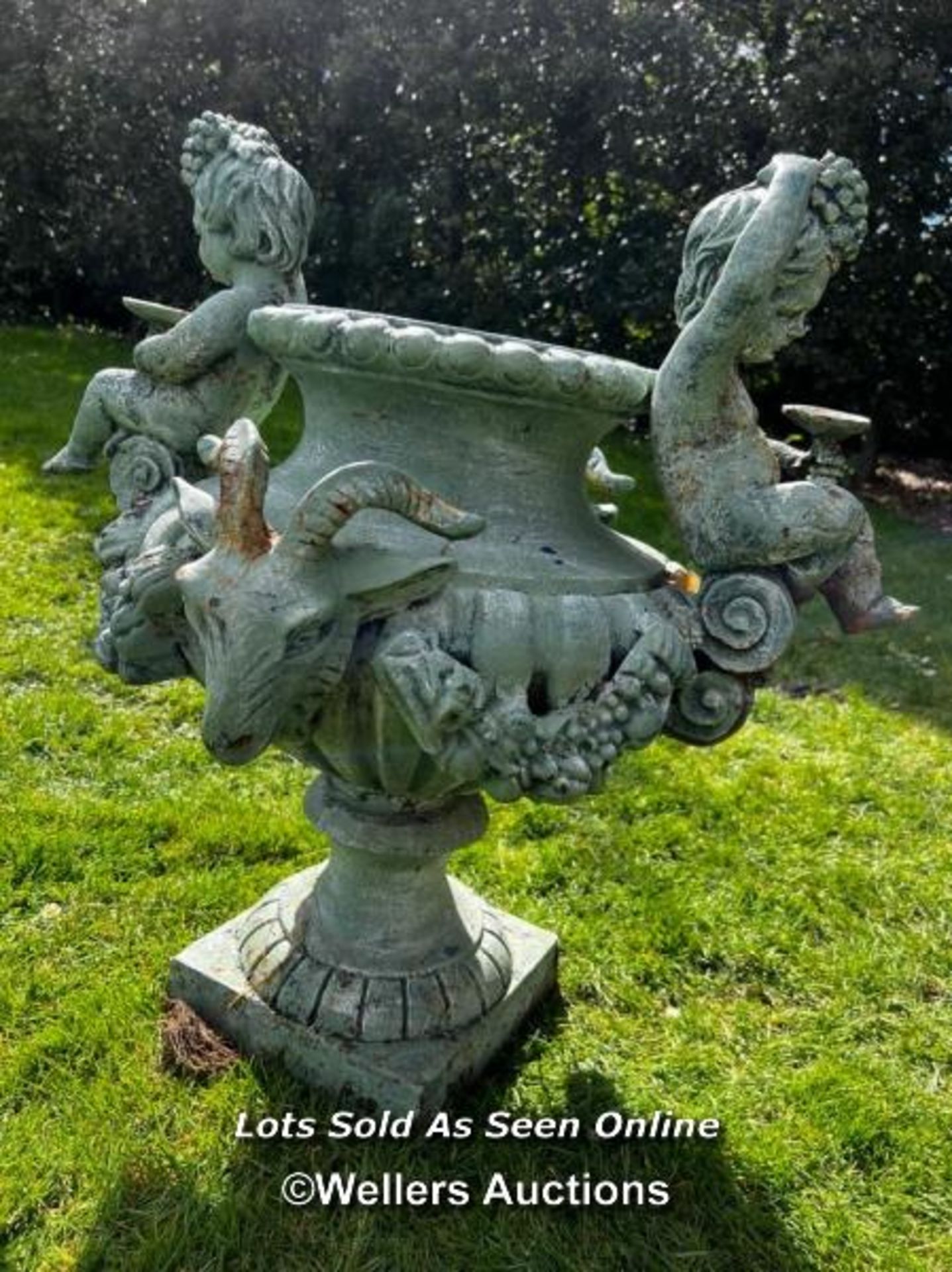 19TH CENTURY FRENCH CAST IRON URN WITH CHERUBS AND RAMS HEAD HANDLES, ONE FOOT REPIARED - Image 5 of 5