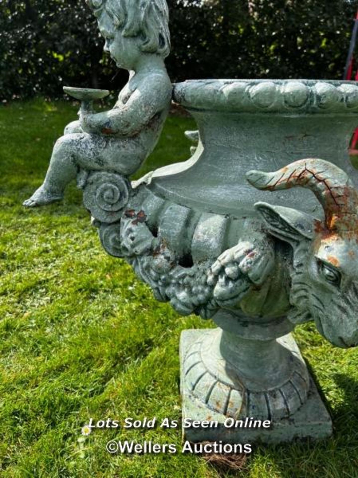 19TH CENTURY FRENCH CAST IRON URN WITH CHERUBS AND RAMS HEAD HANDLES, ONE FOOT REPIARED - Image 3 of 5