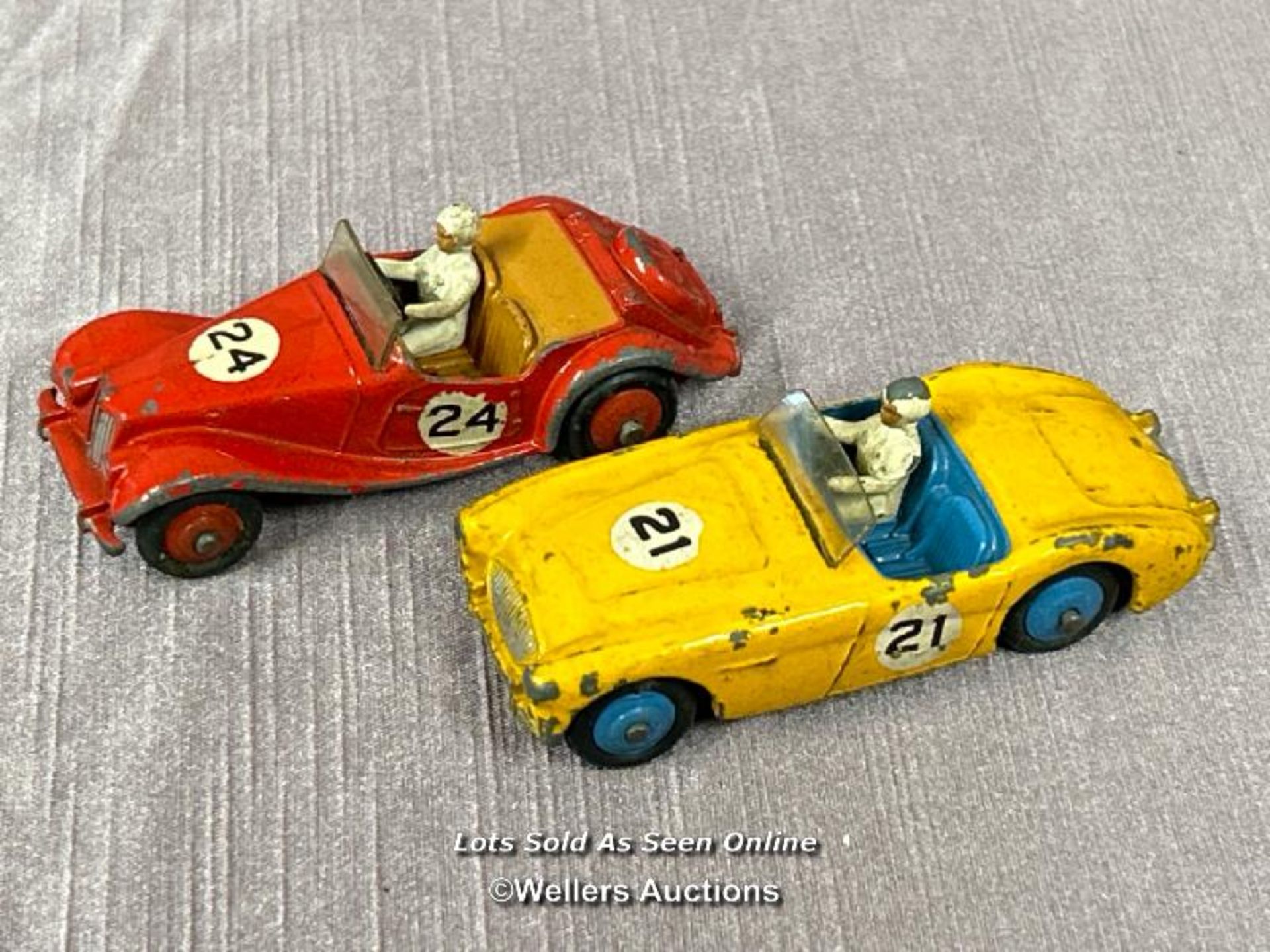 TWO DINKY DIE CAST RACING CARS INCLUDING MG MIDGET NO. 108 AND AUSTIN HEALEY NO. 109