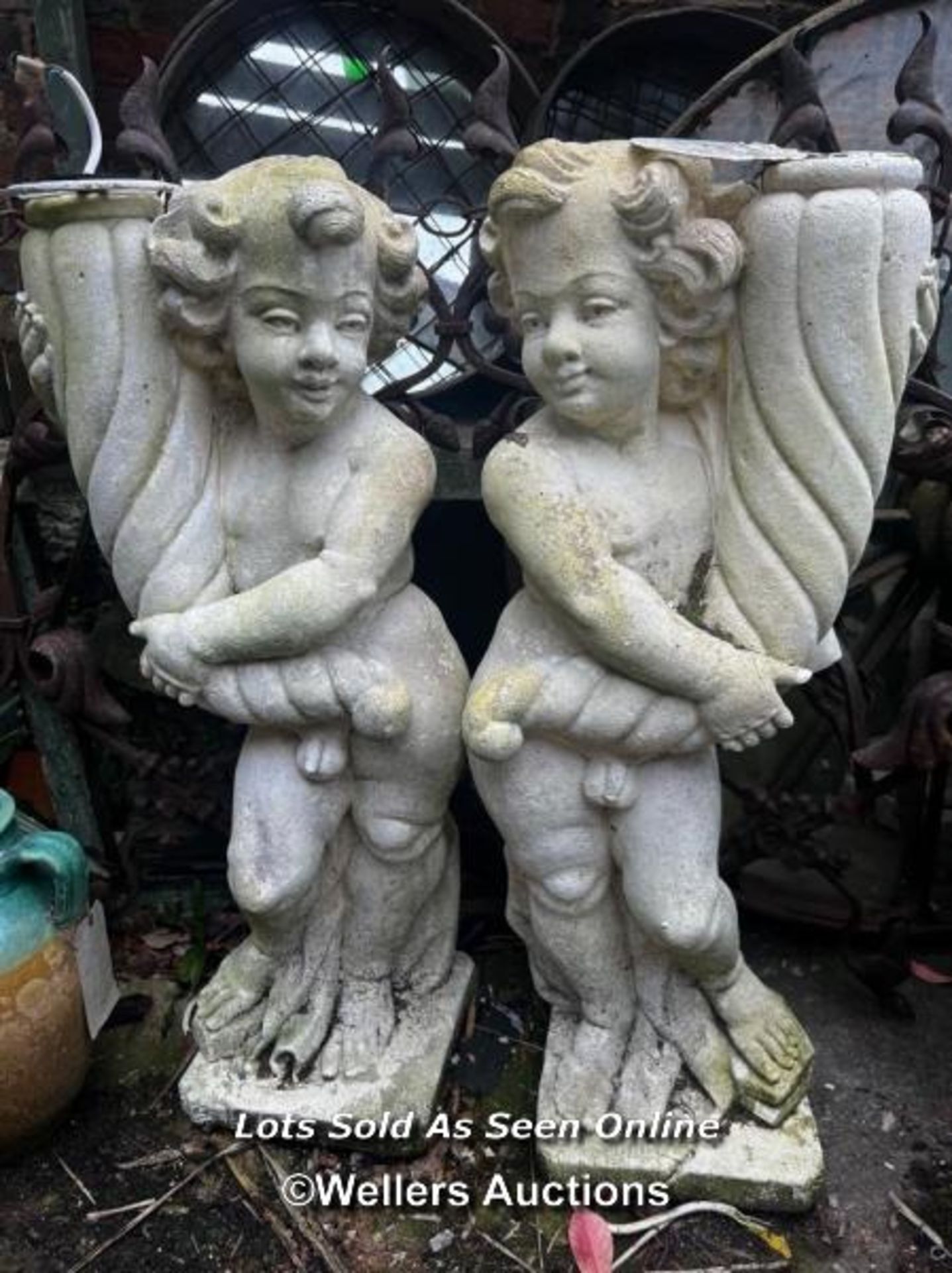 PAIR OF MARBLE COPOSITION CHERUBS SUPPORTING CORNUCOPIA, PREVIOUSLY USED AS LAMPS, THIS LOT IS