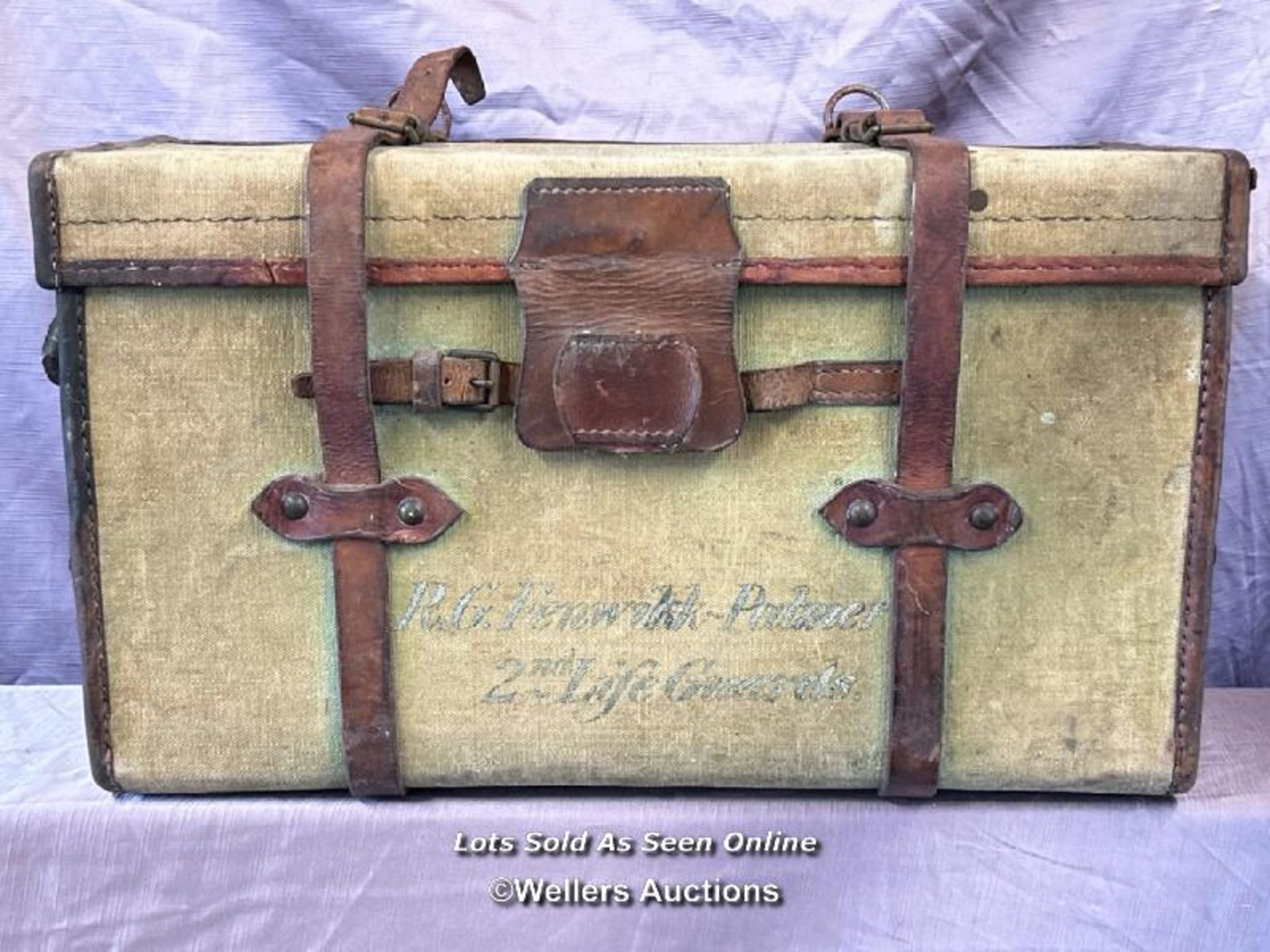 VINTAGE CANVAS MILITARY TRUNK WITH LEATHER MOUNTS AND STRAPS, PREVIOUSLY OWNED BY R G FENWICK-