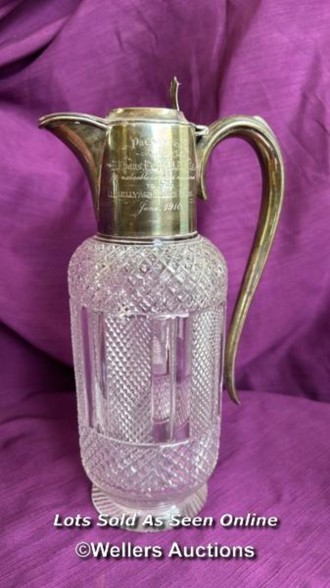 HALLMARKED SILVER TOPPED AND CUT GLASS CARAFE WITH INSCRIPTION, DATED 1910, HEIGHT 24GM