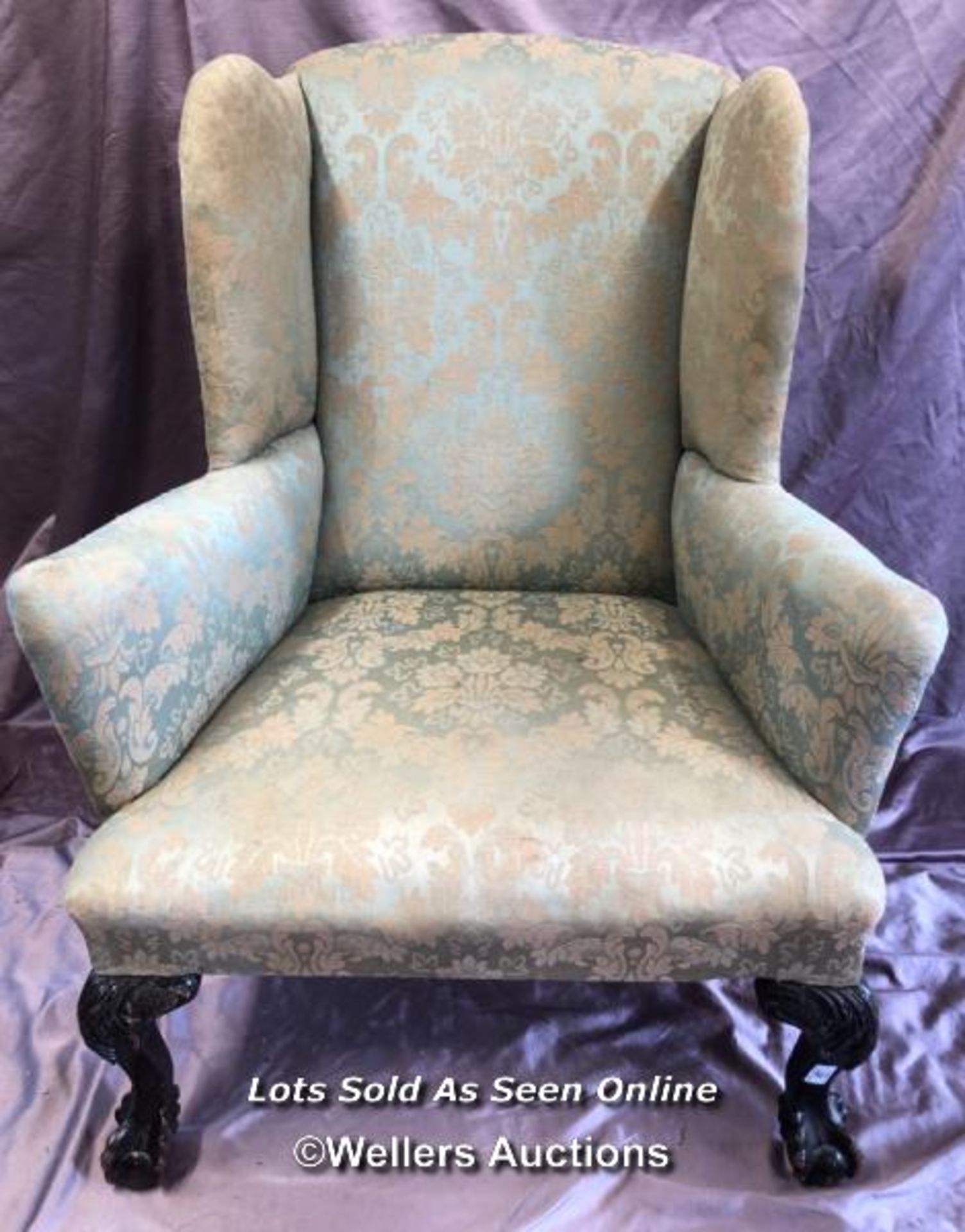 UPHOLSTERED WINGBACK ARMCHAIR ON CLAW AND BALL FEET, 105 HIGH