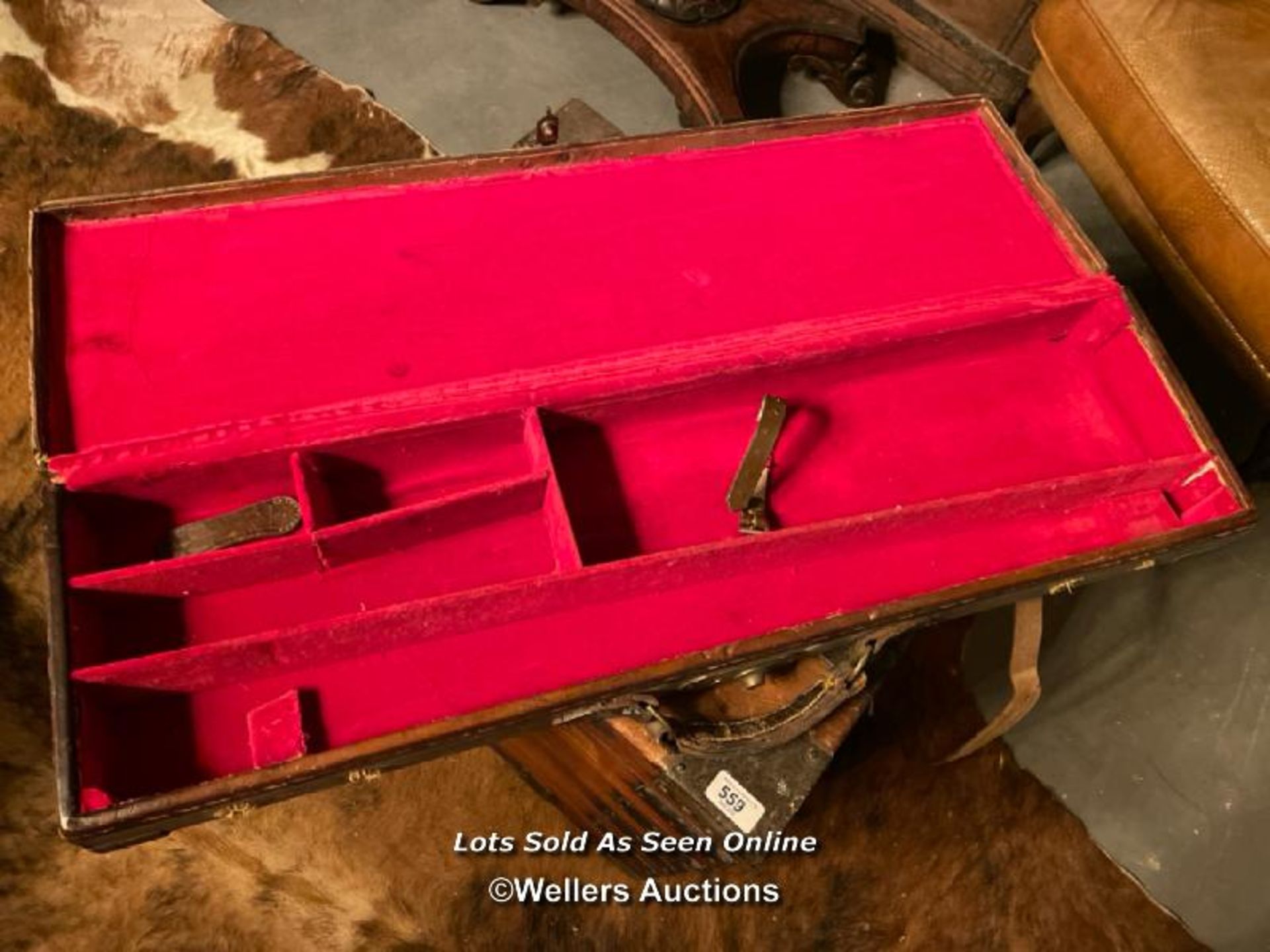 19TH CENTURY LEATHER GUN CASE WITH BRASS CORNERS, RED VELVET LINED, 83 X 23CM