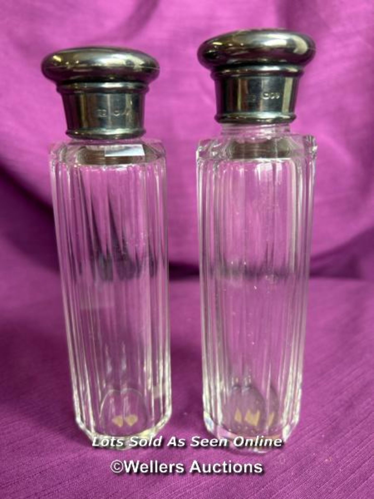 PAIR OF HALLMARKED SILVER TOPPED AND CUT GLASS BEVELLED JARS, HEIGHT 14CM, TOTAL SILVER WEIGHT 26GMS