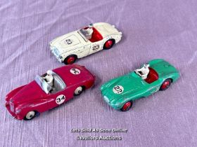 THREE DINKY DIE CAST RACING CARS INCLUDING SUNBEAM ALPINE NO. 107, AUSTIN HEALEY NO. 109 AND ASTON