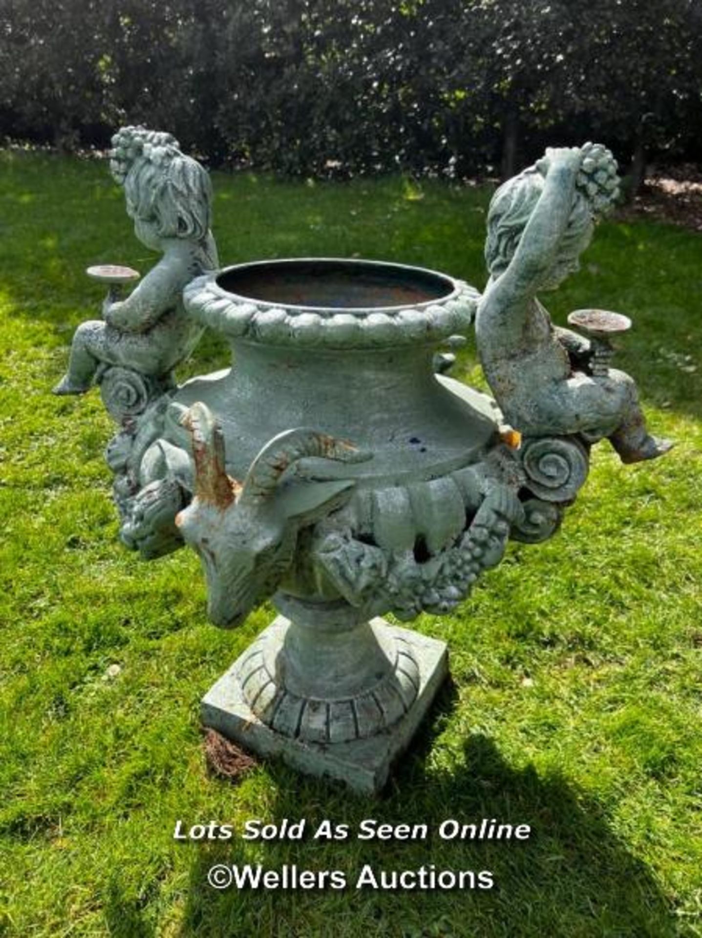 19TH CENTURY FRENCH CAST IRON URN WITH CHERUBS AND RAMS HEAD HANDLES, ONE FOOT REPIARED - Image 4 of 5