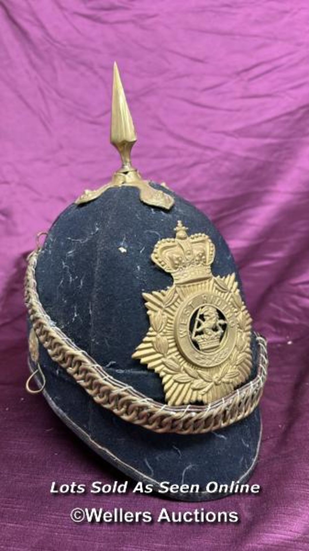 BRITISH HOME SERVICE SPIKED HELMET TO THE WEST RIDING REGIMENT, APPEARS TO BE THEATRICAL