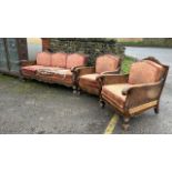 ORNATELY CARVED DOUBLE CANED BERGER LOUNGE SUITE, IN NEED OF SOME RESTORATION, THREE SEATER SECTION