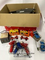 Four vintage V.I.P Raceways track cars, two boxed with three Scalextric controllers, two M.R.R.C.