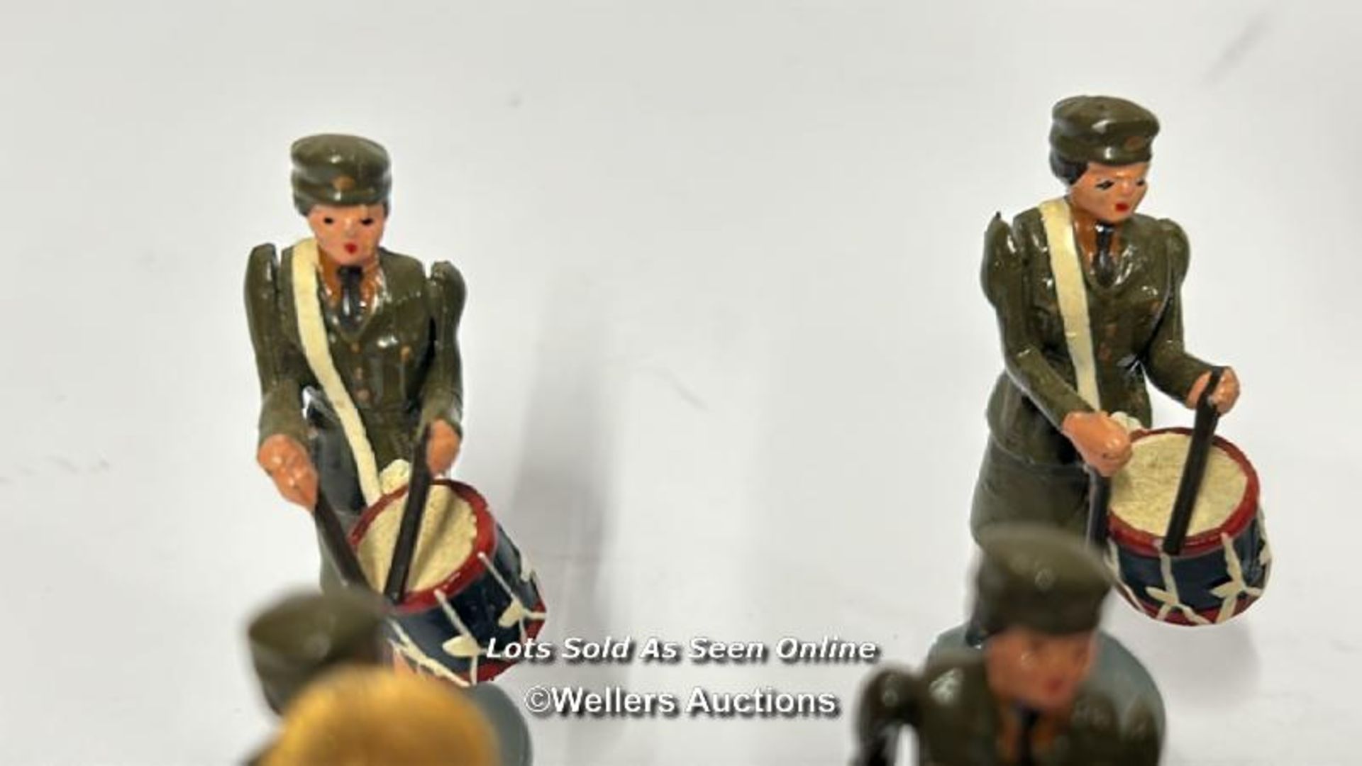 A group of eleven hand painted lead figures of a female marching band in WWII era uniform / AN5 - Image 5 of 7