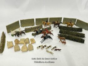 Models including metal and plastic horses with riders, lead greyhounds, walls, hedges and sand