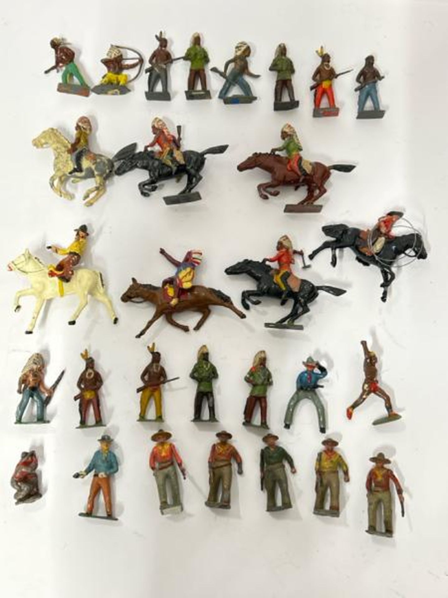 Mainly Britains lead 'Wild West' figures including horses, Cowboys and Native American warriors (29)
