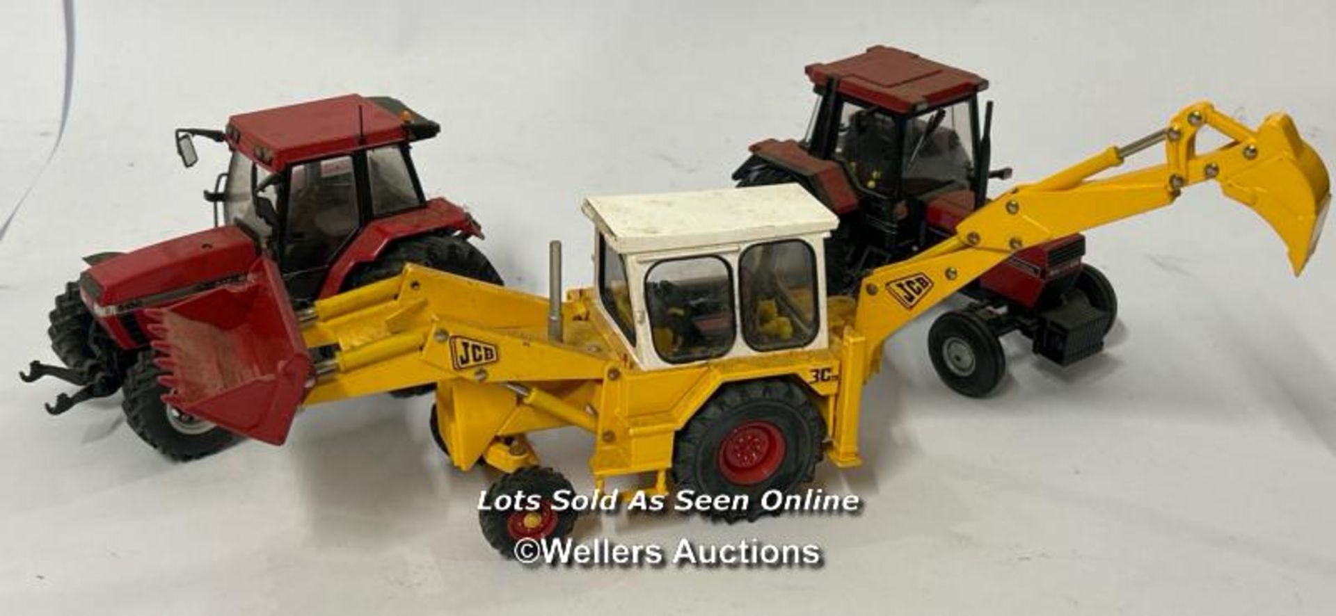 Britain's JCB digger no. 42905 with two model tractors / AN4 - Image 9 of 9