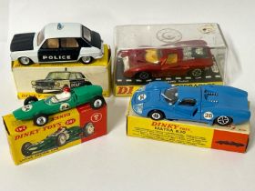 Group of four boxed Dinky diecast cars including Mantra 360 no.200 Lotus Racing car no.241 (
