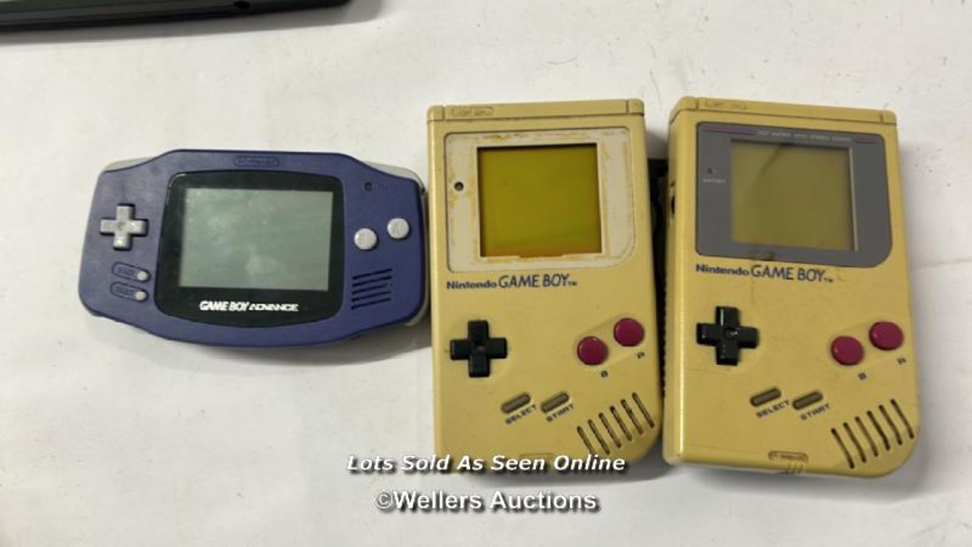 Three vintage hand held Game Boy consoles, all as found with three Pokémon games and Bad 'n' Rad - Image 4 of 7