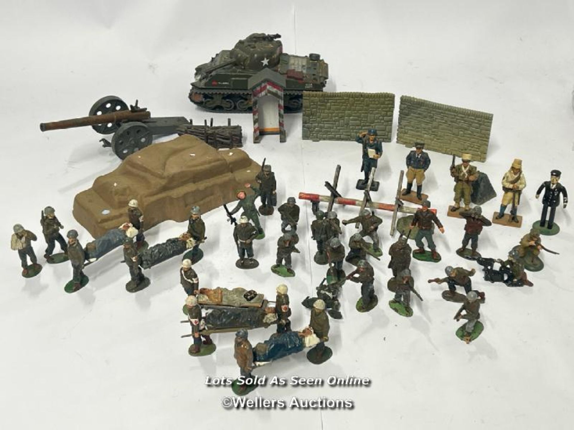 Assorted military figures and accessories including metal hand painted soldiers, plastic soldiers,