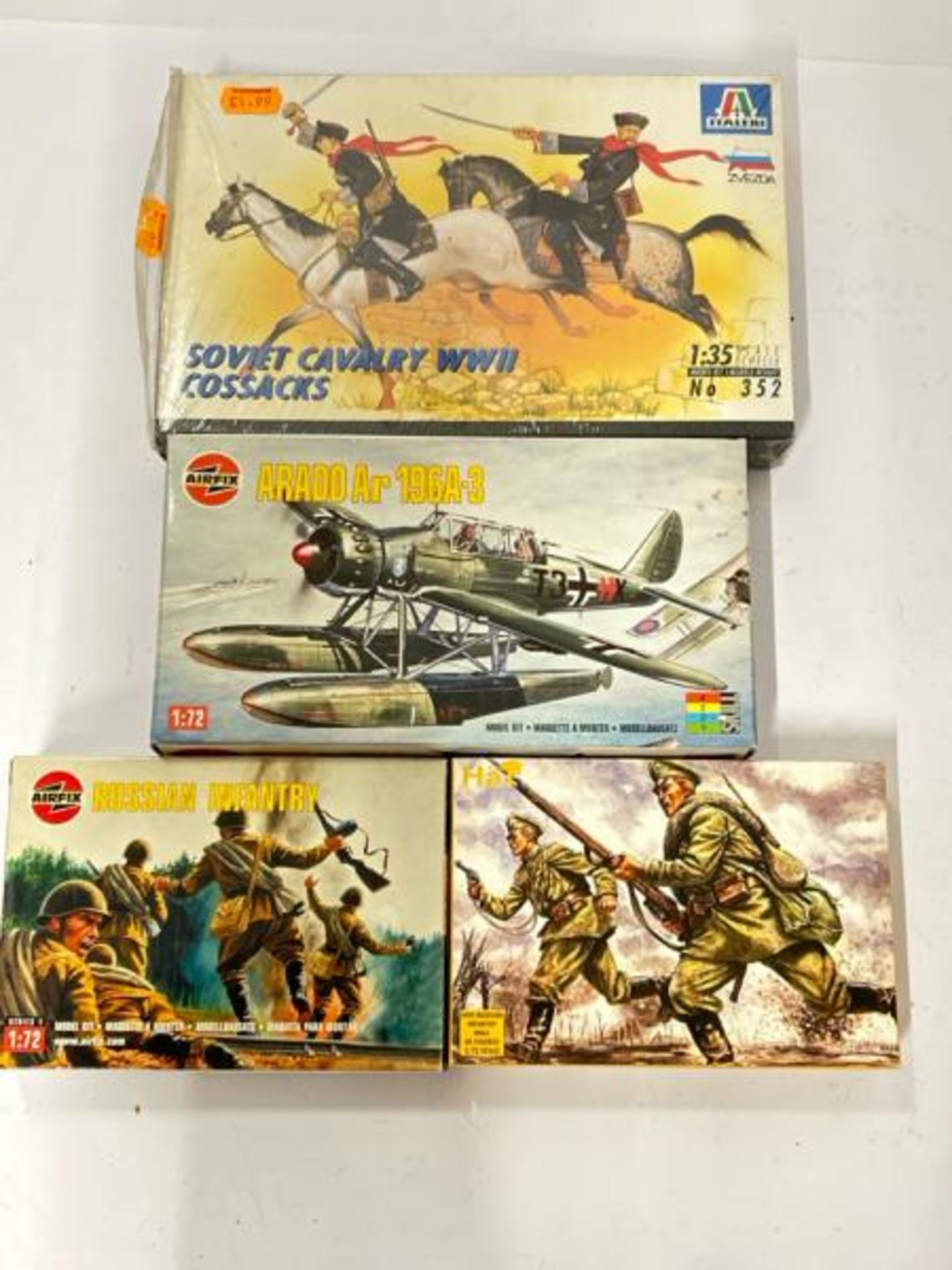 Four assorted WWII and WWI model kits including Airfix Arado AR 196A-3 plane / AN20