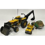 Tonka tractor with digger arm and two small Tonka trucks / AN19