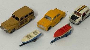 Assorted unboxed model cars including Dinky, Ambassador and Corgi with Lesnsey boats and trailers