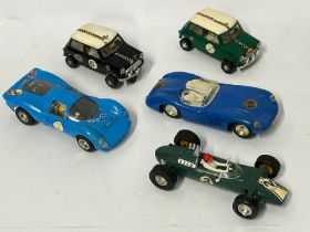 Five unboxed Scalextric cars including two Mini Coopers / AN15