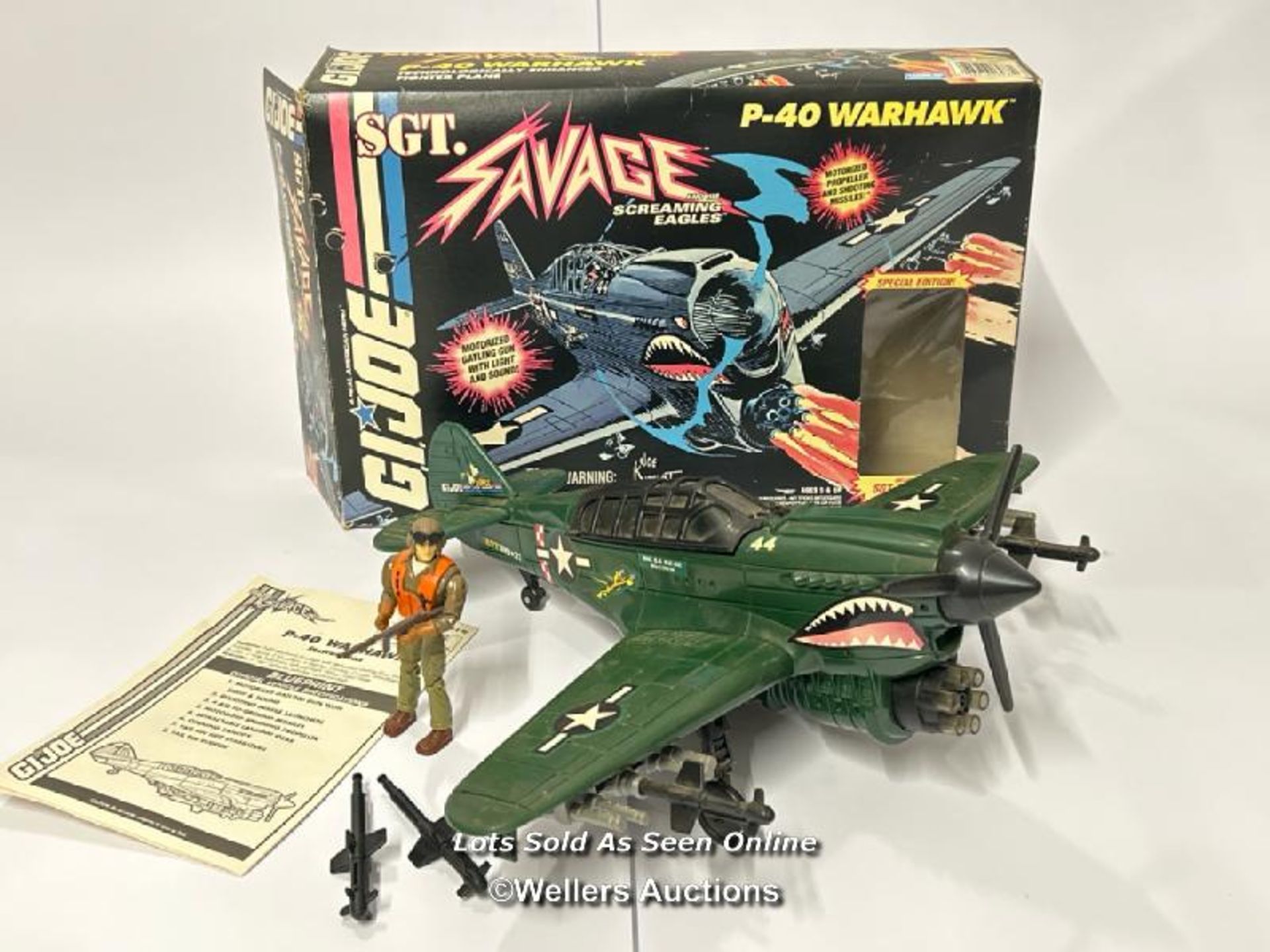 Hasbro GI Joe boxed P-40 Warhawk plane with St. Savage action figure, in fair condition with working