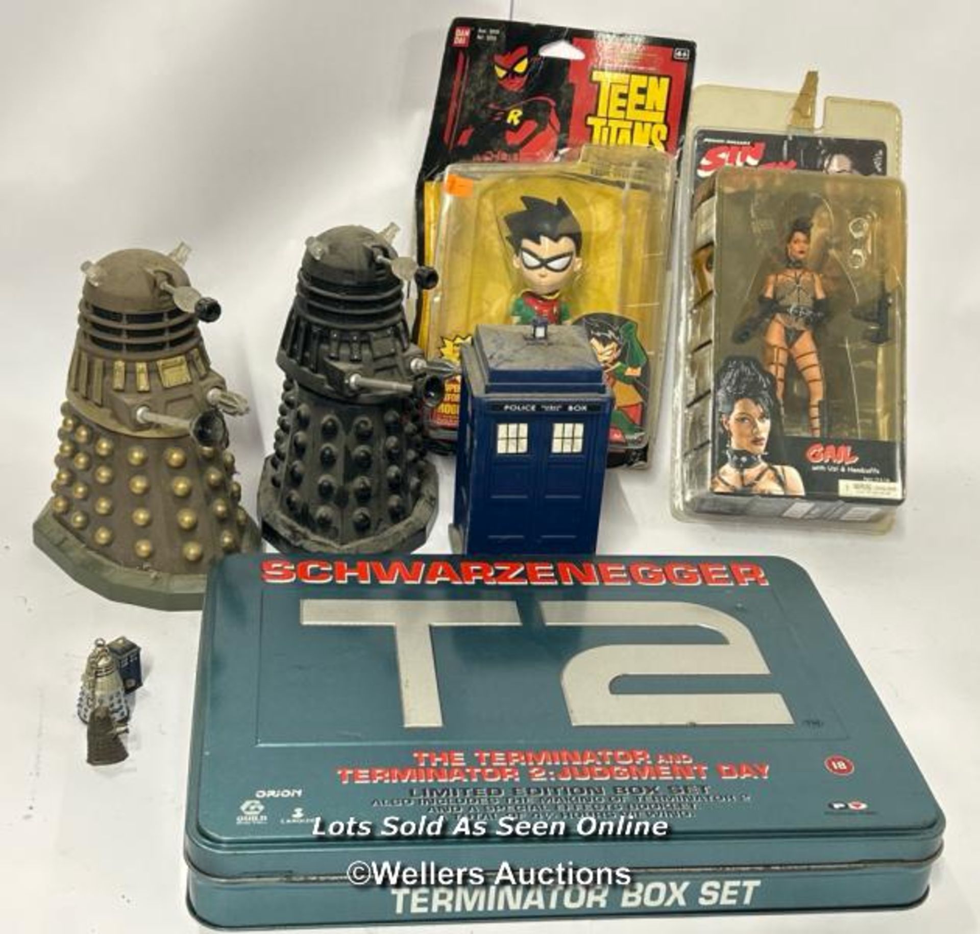 Film & TV related toys and VHS including Dr Who, Sin City, Teen Titans and Terminator 2 VHS box