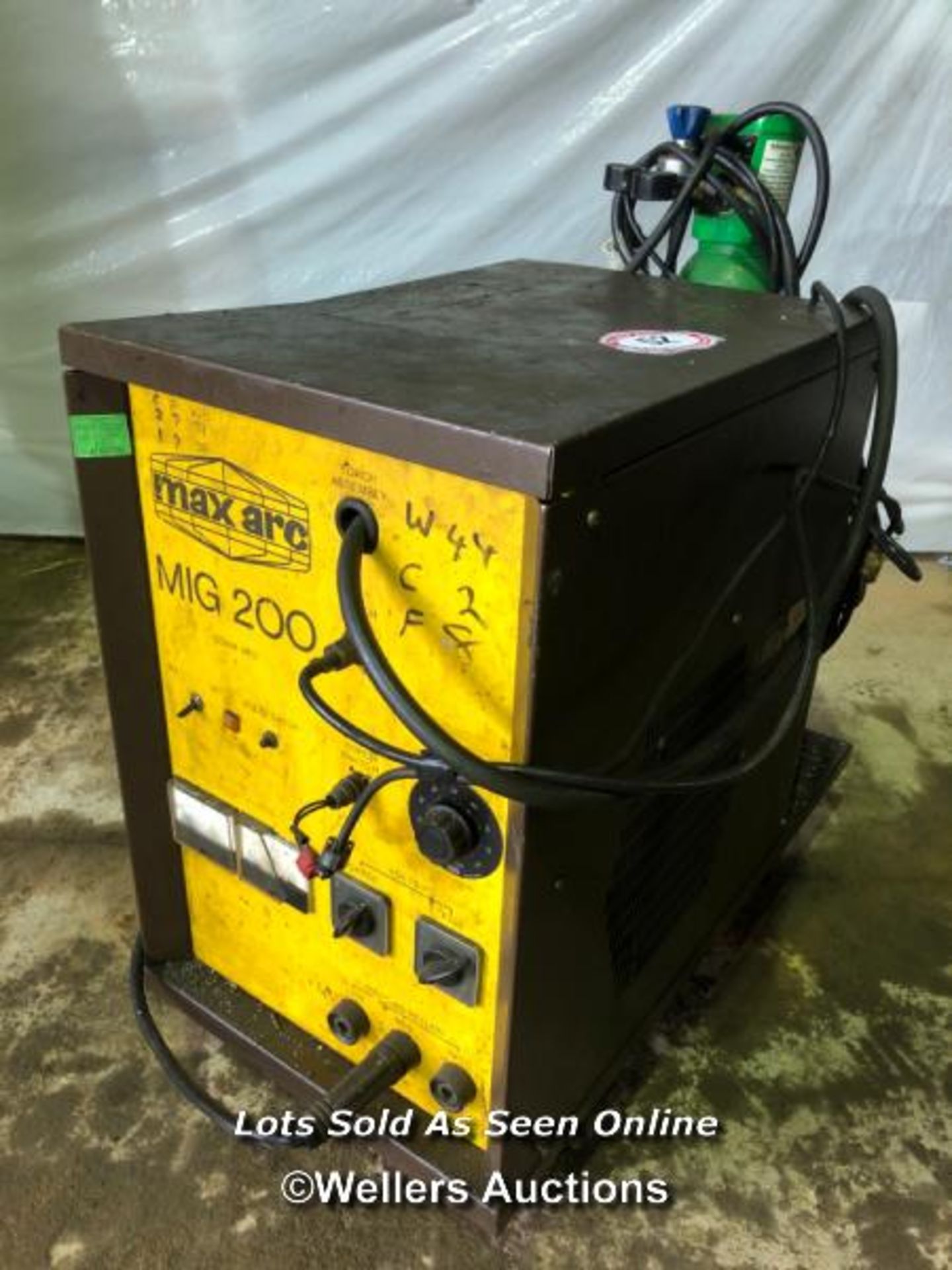 MAX ARC MIG 200 3 PHASE WELDER, CONTENTS INCL. WIRE, FACE SHIELD, AND GAS BOTTLE, IN WORKING ORDER