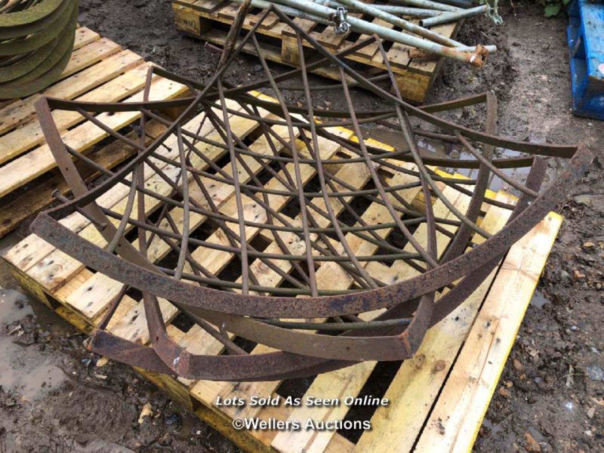 NINE CAST IRON CORNER HAY RACKS, EACH APPROX. 100CM W