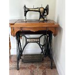 Jones sewing machine number 33225 with flip top table 75cm high (collection from private residence