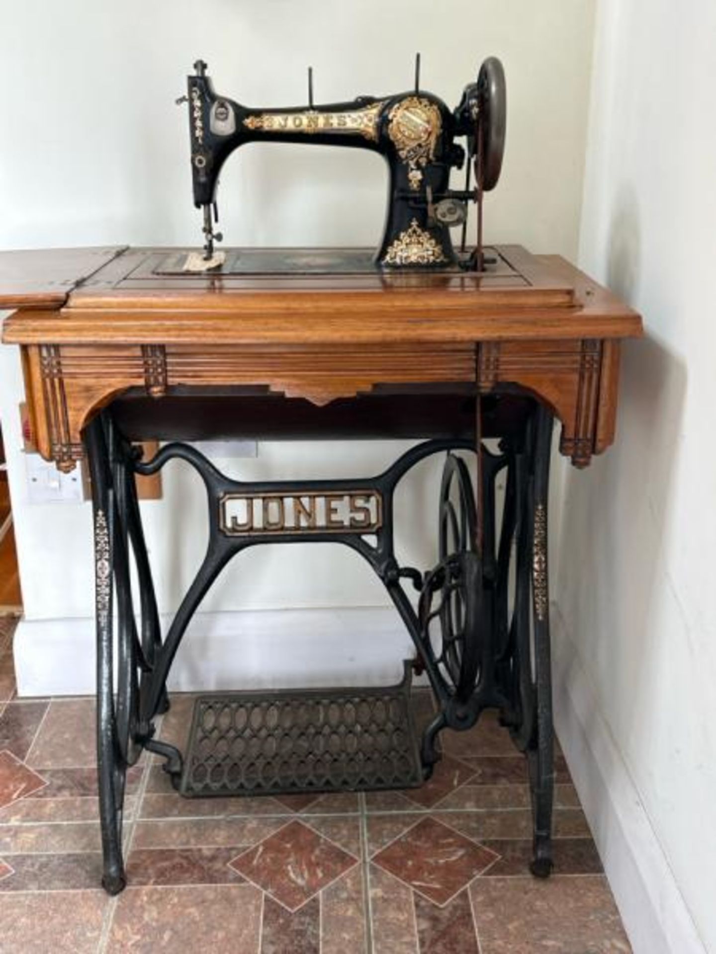 Jones sewing machine number 33225 with flip top table 75cm high (collection from private residence