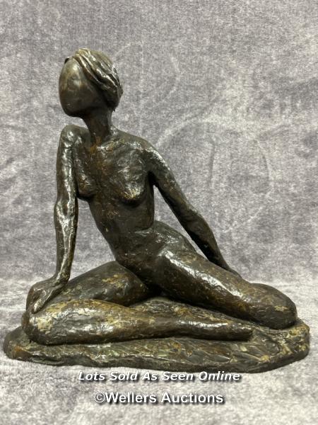 A bronze effect resin abstract figure of a nude female, 35cm high / AN1