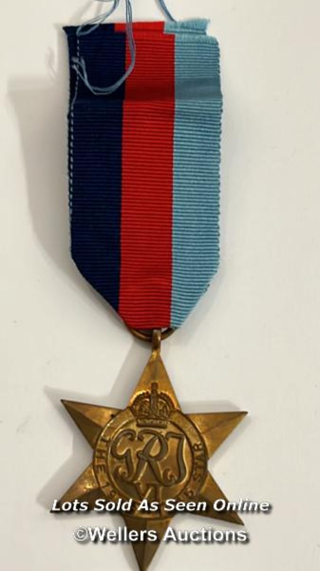 Four medals including the Italy star and the 1939-1945 star with a military cap badge stamped Silver - Image 4 of 13
