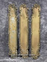 Three painted metal door handle backings in art nouveau style, 52cm long x 8.5cm wide