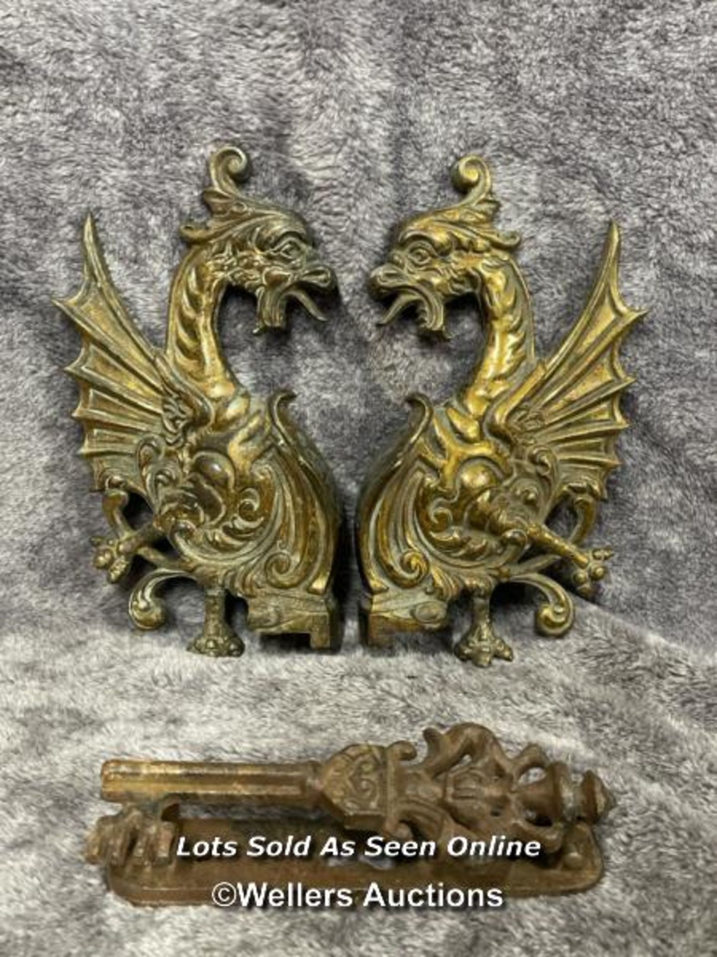 A pair of brass door fixtures in form of a dragon and one other iron door knocker, dragons 20cm high