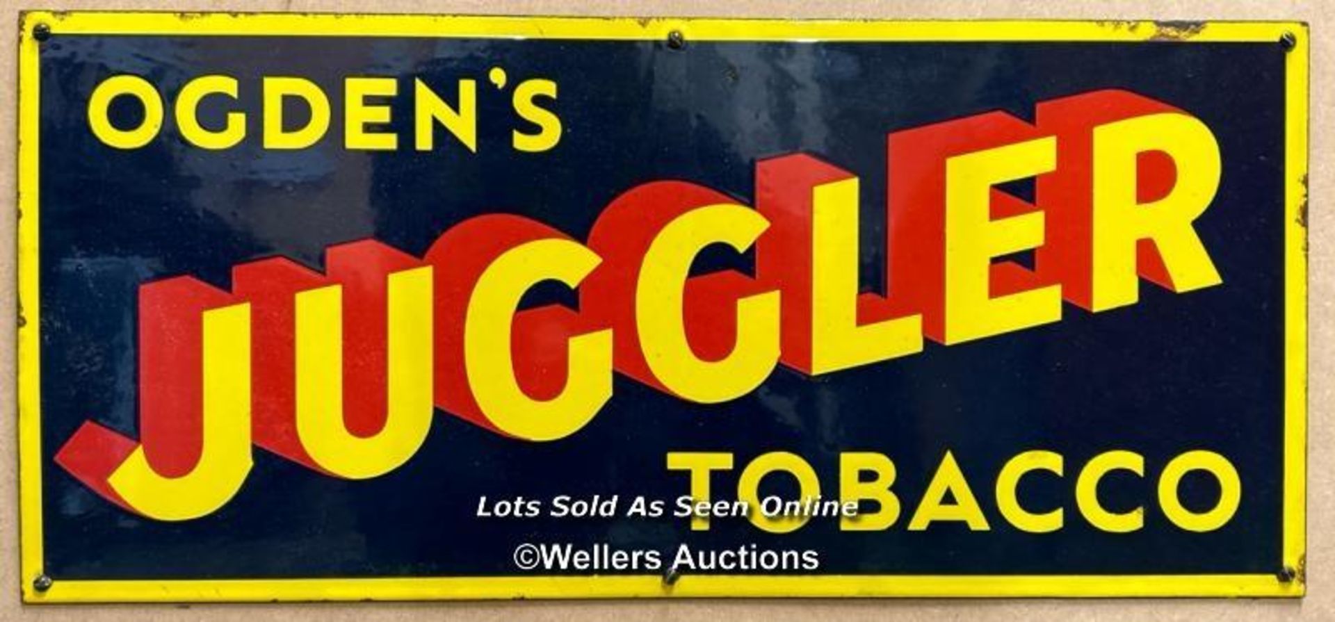 Vintage enamel tobacco sign "OGDEN'S JUGGLER TOBACCO", 56x26cm