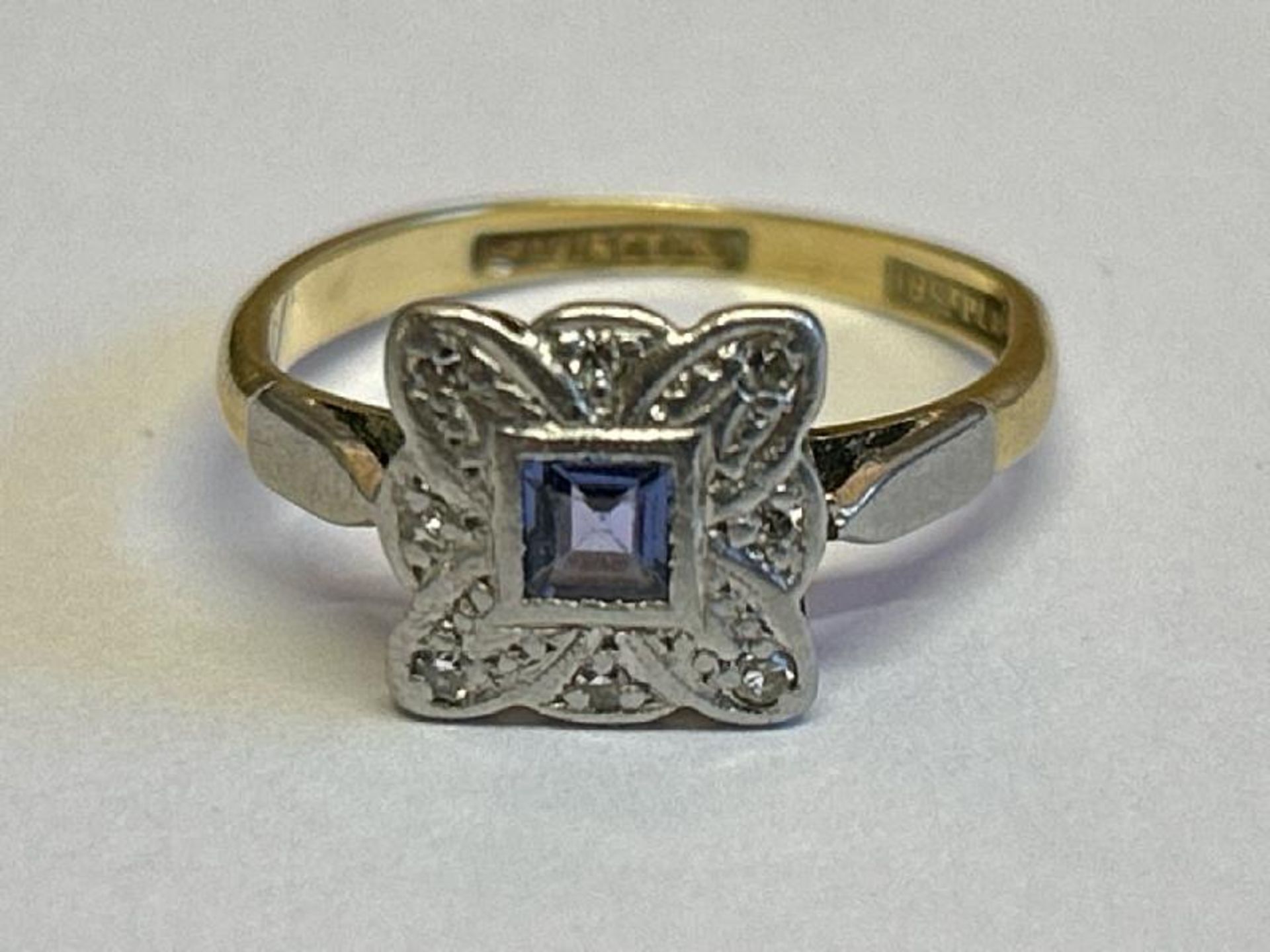 Square sapphire and diamond plaque style ring stamped Bravingtons 18ct and Plat. Ring size L,