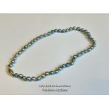 A single row of 6.5 - 7mm baroque cultured pearls of blue stone on a silver clasp / SF